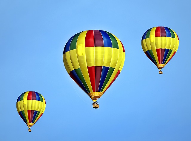 Three colourful hot air balloons