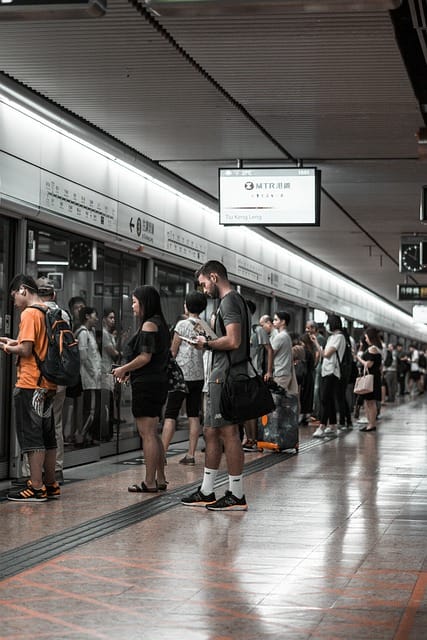 waiting to board a train