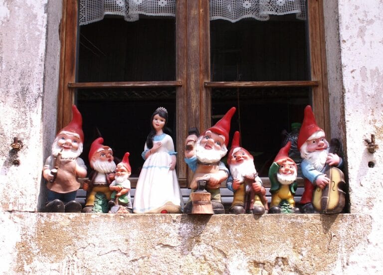 Snow White & the 7 Dwarves on a window ledge