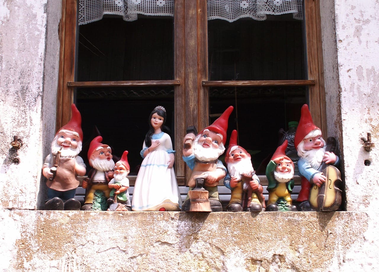 Snow White & the 7 Dwarves on a window ledge